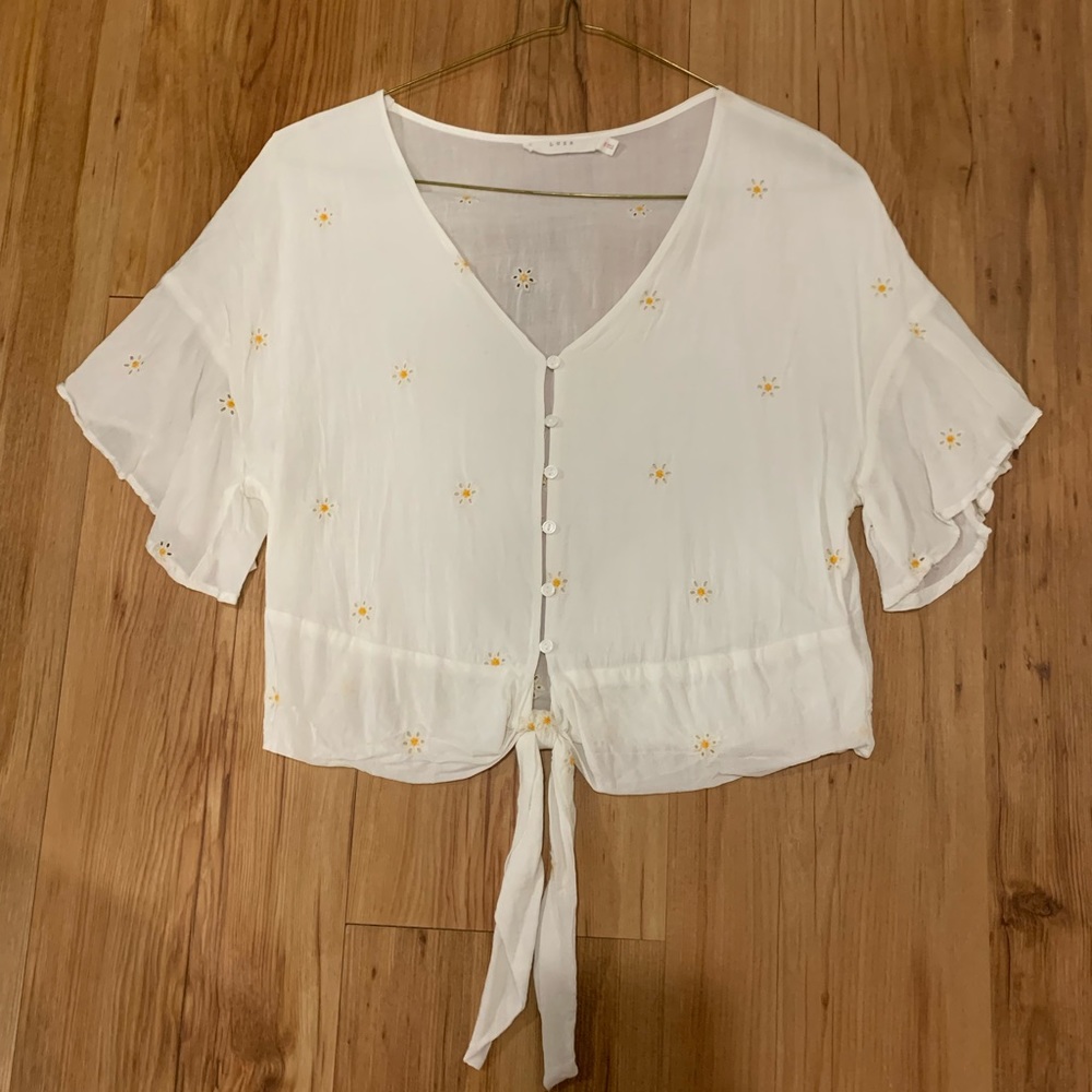 Cropped button up top with flower details